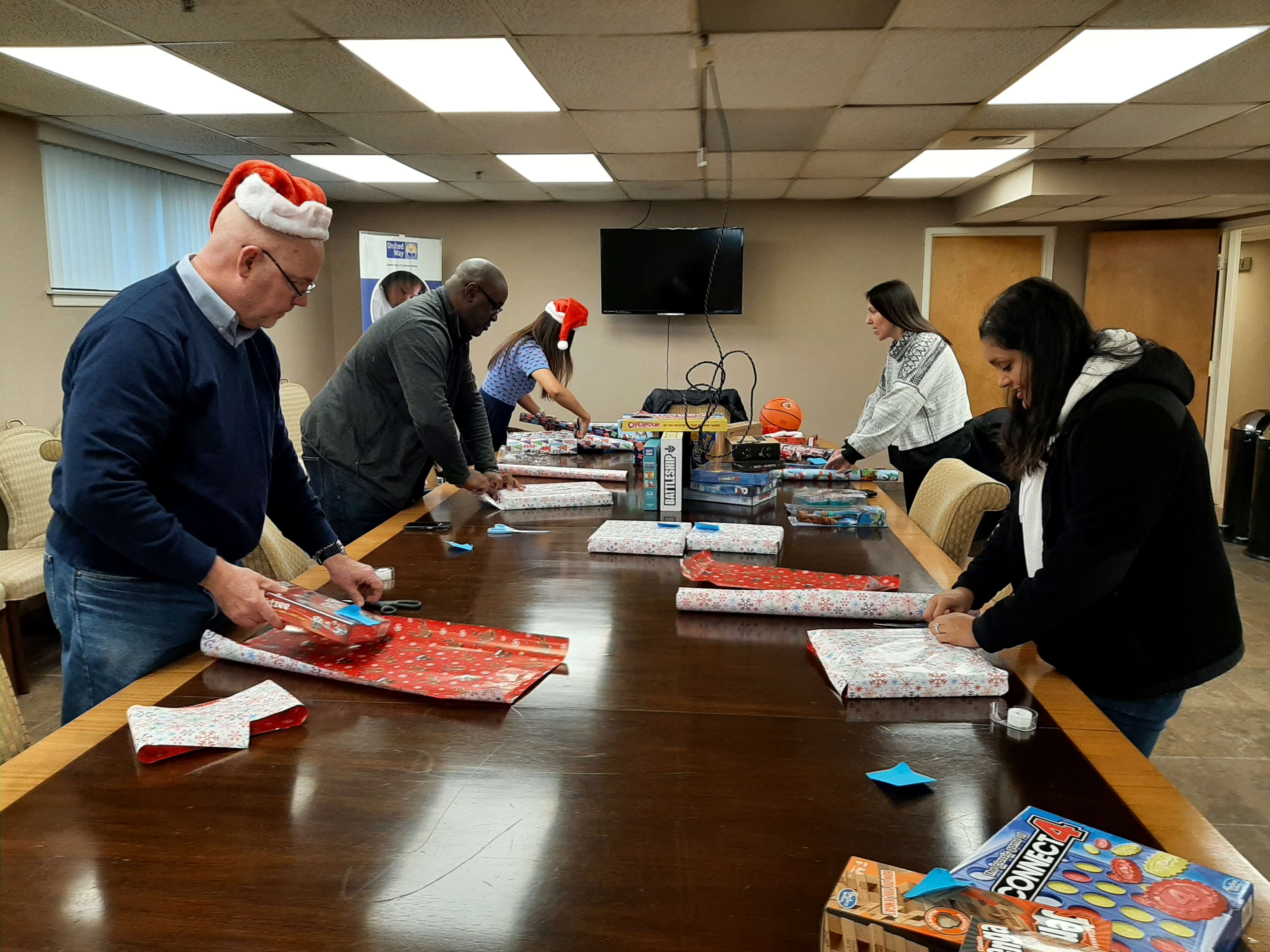 Volunteers from Johnson & Johnson donated and wrapped gifts