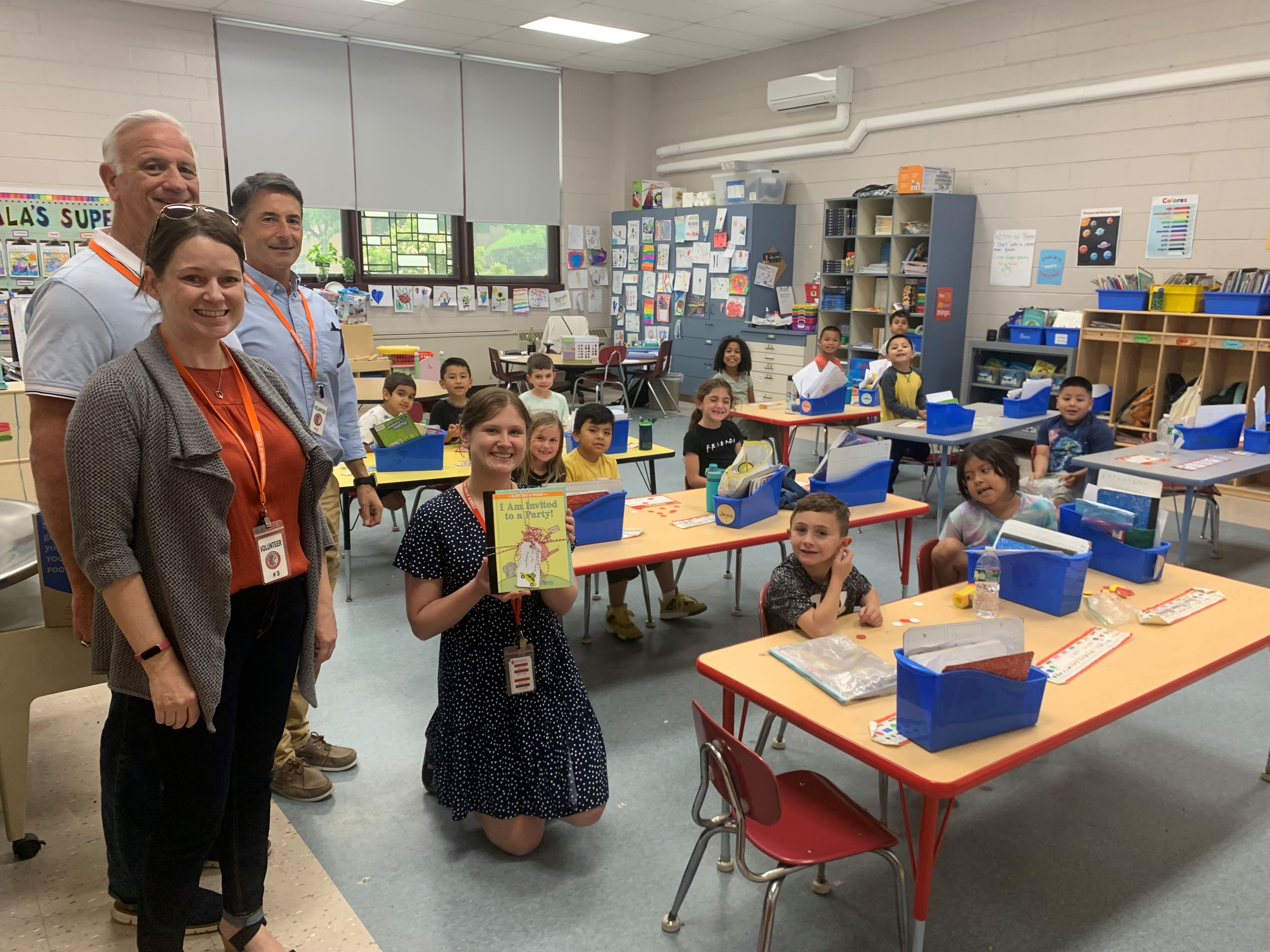 Volunteers from Johnson & Johnson donated new children's books to JFK Elementary School in Jamesburge