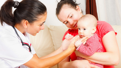 NFP Mom with Nurse and baby