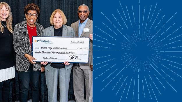 Gloria Aftanski and Dale Callender accepting a $12,500 check from the Provident Bank Foundation.