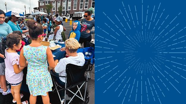 Children and parents gathered around the Alliance table at a community Ice Cream Social sponsored by Assemblywoman Yvonne Lopez.